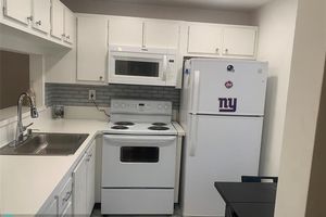 9081 LIME BAY BLVD 214, TAMARAC, FL