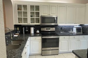 7635 SOUTHAMPTON TER 201, TAMARAC, FL