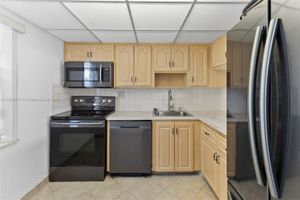 7887 GOLF CIRCLE DR 203, MARGATE, FL