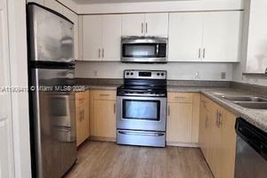 7930 N NOB HILL RD APT 106, TAMARAC, FL