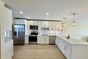 7887 GOLF CIRCLE DR 211, MARGATE, FL