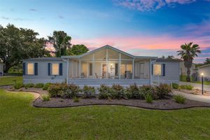 7706 COUNTY ROAD 109D, LADY LAKE, FL