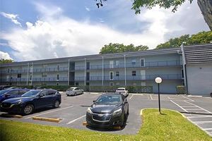 9351 LIME BAY BLVD APT 212, TAMARAC, FL