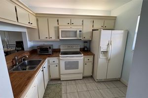 7118 GOLF COLONY CT APT 103, LAKE WORTH, FL