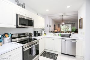 8365 WHISPER TRACE WAY # L-103, NAPLES, FL