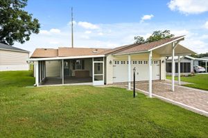 1833 W SCHWARTZ BLVD, LADY LAKE, FL