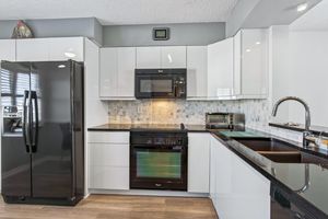 7290 KINGHURST DR 703, DELRAY BEACH, FL