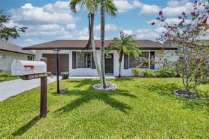 6338 TALL CYPRESS CIR, GREENACRES, FL