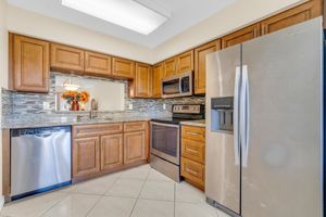 7290 KINGHURST DR APT 406, DELRAY BEACH, FL