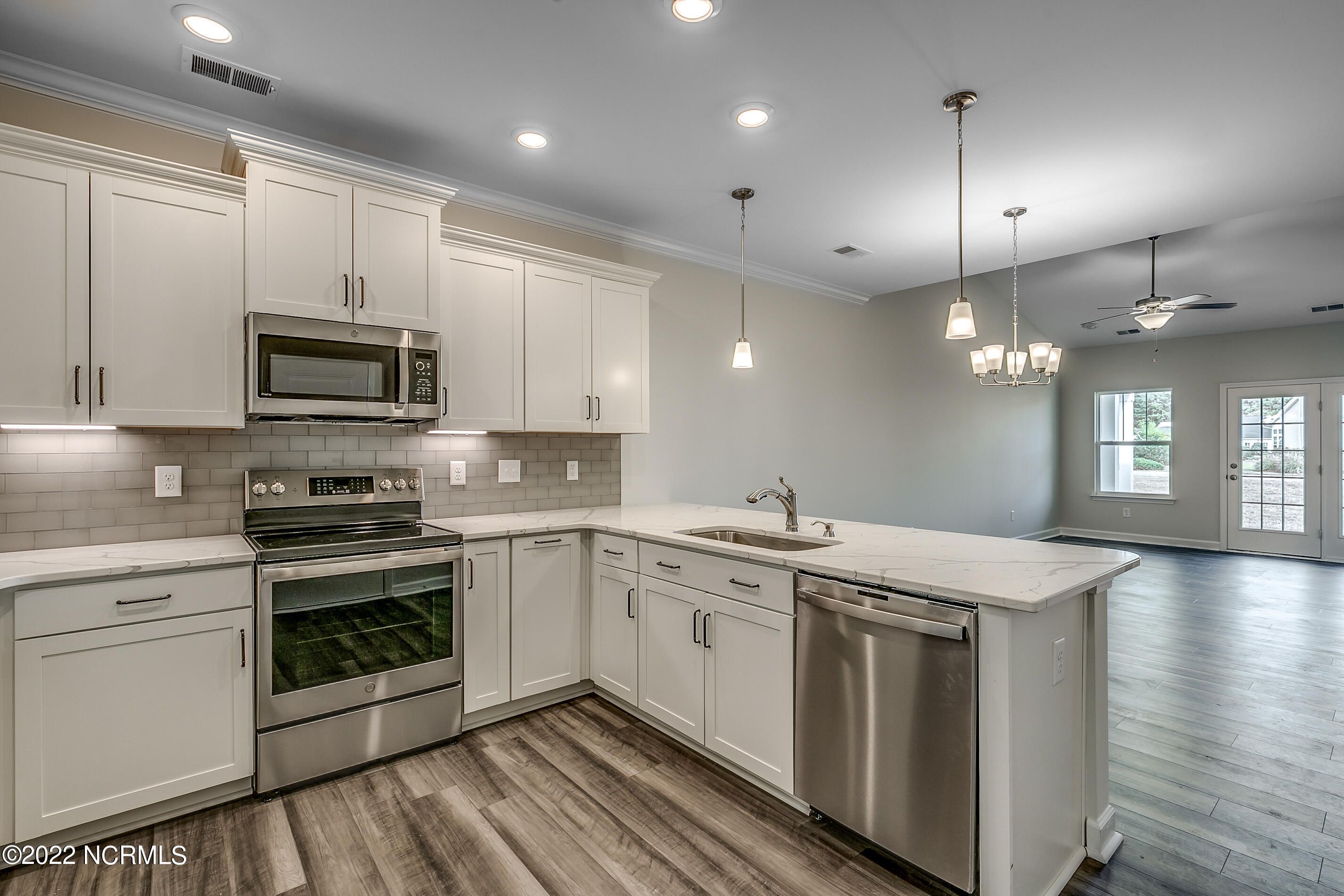 image of property at 8832 Radcliff Drive NW Lot 19